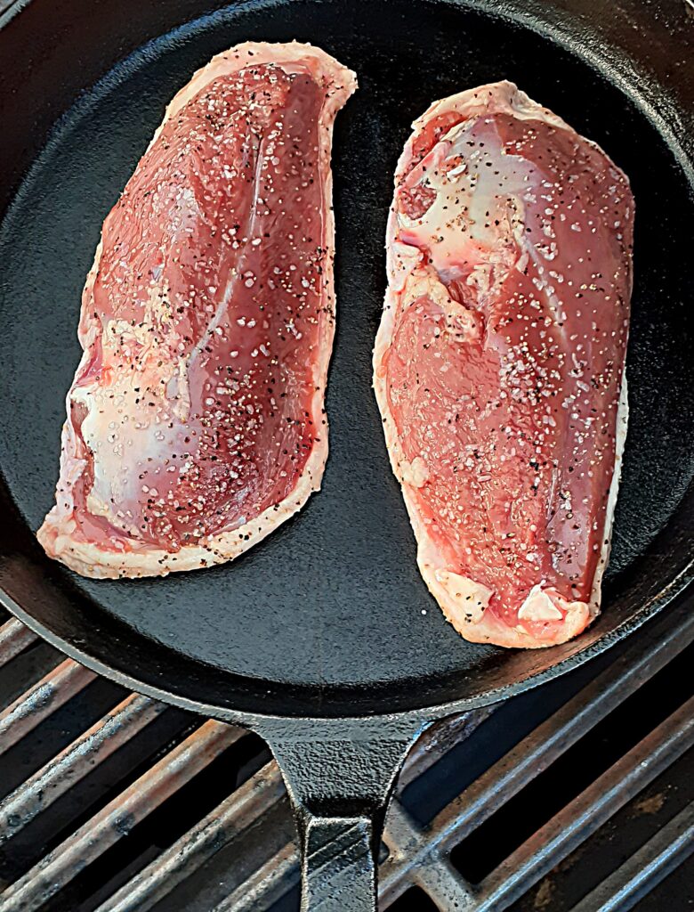 grilled duck breast in skillet