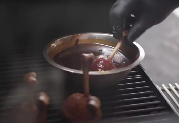 firecracker chicken glazing drumsticks
