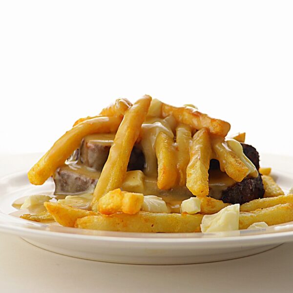 smoked meatloaf poutine plated with fries