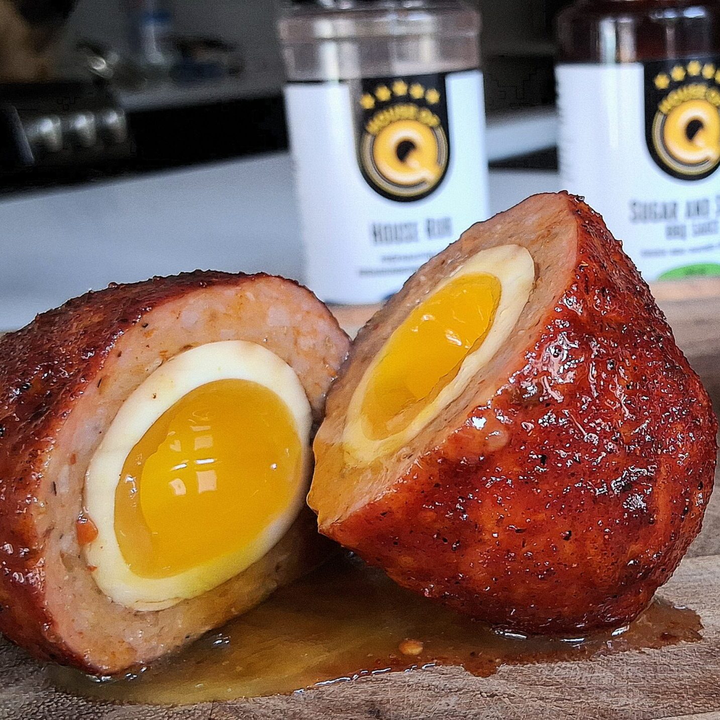 split scotch eggs with creamy egg yolk square