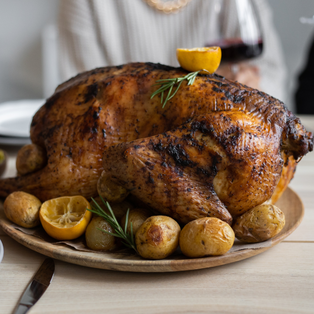 whole turkey on plate BBQ Brian’s Whole-Smoked Turkey